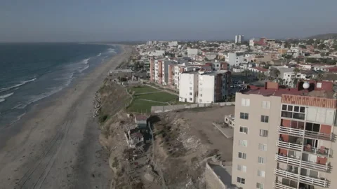 4K DRONE Apartment Complex on Tijuana Beach, Facing San Diego Border, 60fps Stock Footage 219662070