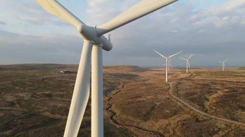 4K Drone Ascending Past Onshore Wind Turbine at Sunset Stock Footage 337001529