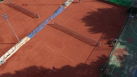4K Drone Camera  images that see the tennis court from a horizontal angle 스톡 동영상 229625960