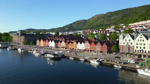 4K drone capturing Bryggen’s UNESCO-listed wharf of Bergen, Norway. Pedestrians Stock Footage 309992272