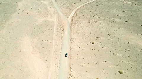 4K Drone Chase Through the Chilean Desert – Car Driving in Vast Sands Stock Footage 314522367