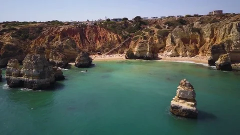 4k drone - Cliffs &amp; Rocks of Praia do Camilo Beach. Lagos, Portugal.  Algarve. Stock Footage 82556257