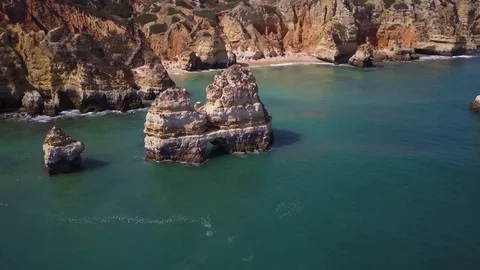 4k drone - Cliffs &amp; Rocks of Praia do Camilo Beach. Lagos, Portugal.  Algarve. Stock Footage 82556398