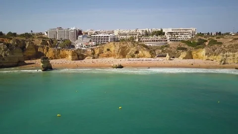 4k drone - Cliffs &amp; rocks of Praia Dona Ana beach.  Lagos, Portugal.  Algarve Stock Footage 82556460