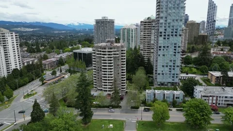 4K Drone Condo Building Mountains 2 (29.97fps) Stock Footage 234005603