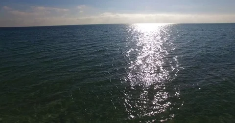 4k Drone Couple in Surf Stock Footage 70737917