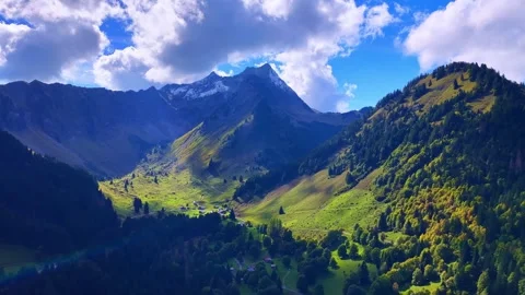 4K Drone Flight Over Alpine Valley and Mountain Landscape Stock Footage 330194431