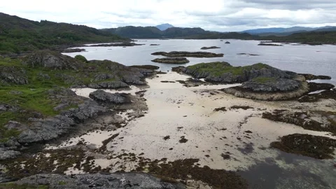 4k Drone flight over beach at Shoe Bay in Moidart Stock Footage 258339896