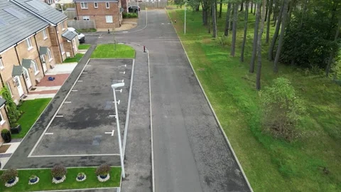 4K Drone Flight Over British New Build Residential Street Stock Footage 254581054
