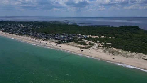 4K Drone Flight Over Corolla Beachfront Homes and Surf Stock Footage 314566151