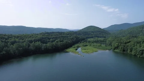 4K Drone Flight Over Lake and Lush Green Forest in Windsor, Vermont USA Stock Footage 113523128