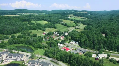 4K Drone Flight Over a Lush Green Small Town in Windsor, Vermont Stock Footage 113523813