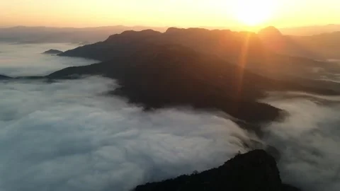 4k drone flight through passing through the mountains with sunset Stock-Footage 344313490