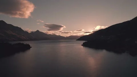 4k drone flight  timelaspe over lake wakatipu sun set Stock Footage 170046065