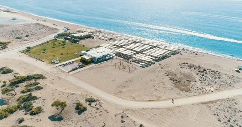 4K Drone Flying On A Beach Above many resting people near the sea Stock Footage 101263857