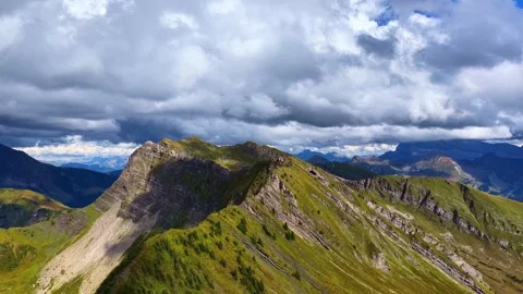 4K Drone Flying Over Alpine Ridge and Mountain Lake France Stock Footage 330581839