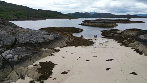 4k Drone flying over beach at Shoe Bay in Moidart towards the sea Stock Footage 258341374