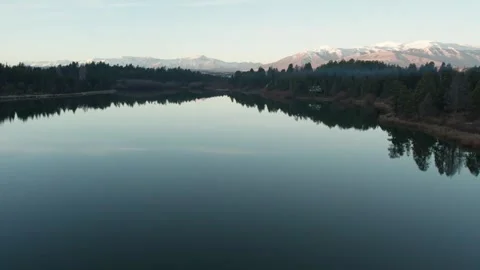 4K drone flying over a beautiful Patagonian lagoon on a cold winter evening. Stock Footage 249754550