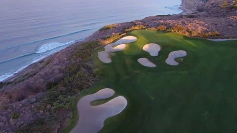 4K drone flying in reverse on hole 10 at Trump National LA Stock Footage 89644807