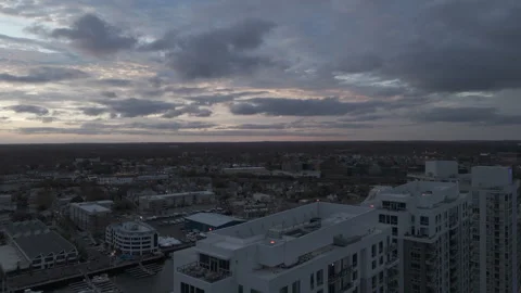 4k drone flying reverse from horizon, revealing high rise building Stock Footage 291241790