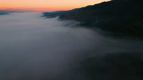 4K Drone Flying through the clouds at dusk or dawn. Aerial top cloudscape  Video stock 166197941