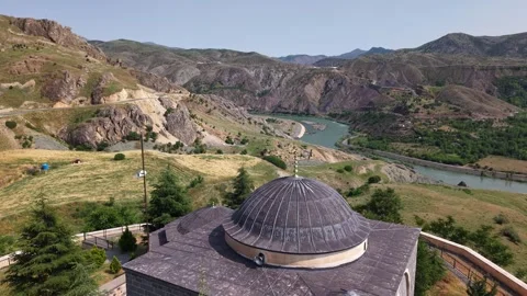 4K Drone Flyover Above Mosque Moving Forward Over Riverside Landscape Vídeo Stock 336246588