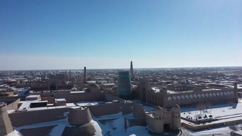 4K Drone Flyover of Snowy Khiva City Architecture, Uzbekistan Stock Footage 345813347