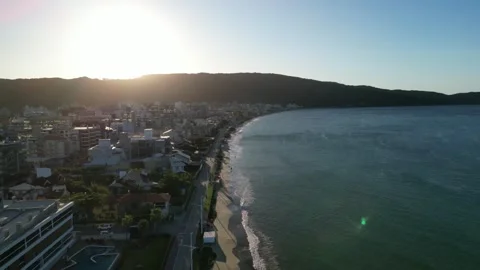 4K Drone Flyover of Sunset Beach with Waves Stock Footage 311553237