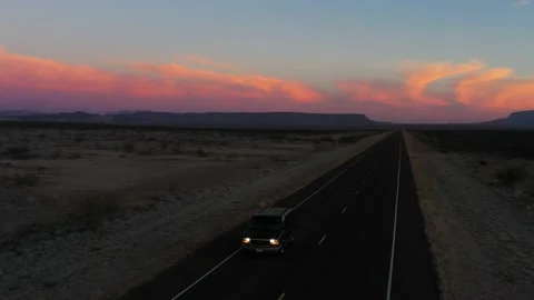 4k Drone Following a Van During Sunrise Video stock 147360952