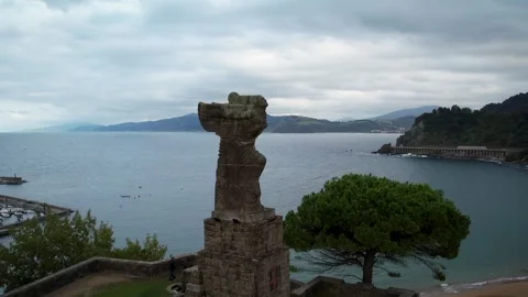4K drone footage of El Cano monument in Getaria village, Basque Country Stock-Footage 344542775