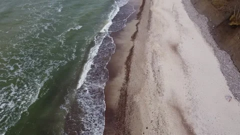 4K Drone Footage Flying Over Waving Baltic Sea Coast Stock Footage 323613059