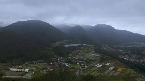 4k drone footage - Mountains, fields, and villages of Gunma Prefecture.  Japan Stock Footage 96044626
