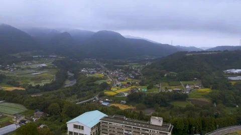 4k drone footage - Mountains, fields, and villages of Gunma Prefecture.  Japan Stock Footage 96044703