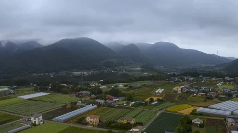 4k drone footage - Mountains, fields, and villages of Gunma Prefecture.  Japan Stock Footage 96045073