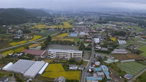 4k drone footage - Mountains, fields, and villages of Gunma Prefecture.  Japan Stock Footage 96045221