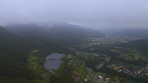 4k drone footage - Mountains, fields, and villages of Gunma Prefecture.  Japan Stock Footage 96045287