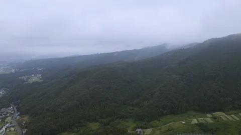 4k drone footage - Mountains, fields, and villages of Gunma Prefecture.  Japan Stock Footage 96045387