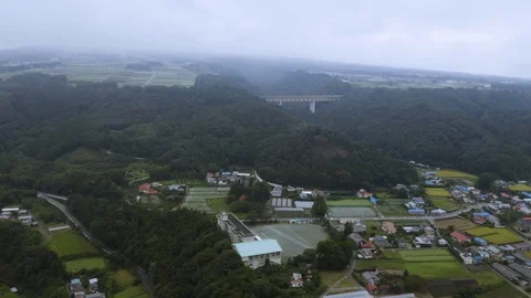 4k drone footage - Mountains, fields, and villages of Gunma Prefecture.  Japan Stock Footage 96045560