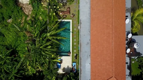 4K Drone Footage of Poolside Villa in Bali Indonesia Canggu Berawa Beach Aerial Stock Footage 101785361