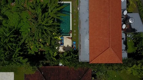 4K Drone Footage of Poolside Villa in Bali Indonesia Canggu Berawa Beach Aerial Video stock 101785433