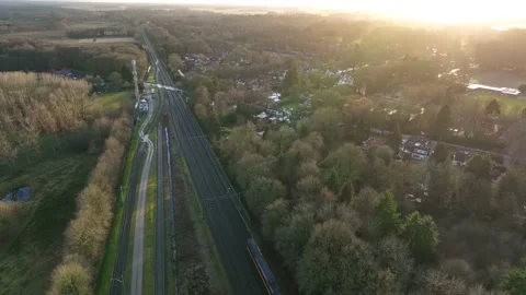4K drone footage train passing by wide shot Stock Footage 171210319