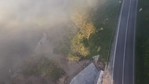 4K Drone Gliding Above Sea Fog at Golden Sunset 스톡 동영상 339317525