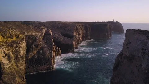 4k drone - Huge cliffs and rugged coast - Algarve region of Portugal.  Lagos Stock Footage 82511918