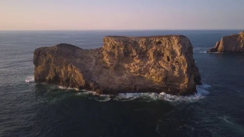 4k drone - Huge cliffs &amp; rugged coast - Algarve region of Portugal, near Lagos Stock Footage 82511713