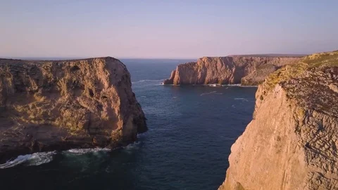 4k drone - Huge cliffs &amp; rugged coast - Algarve region of Portugal, near Lagos Stock Footage 82511818