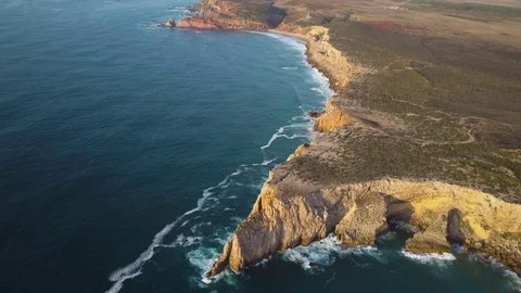 4k drone - Huge cliffs &amp; rugged coast - Algarve region of Portugal, near Lagos Stock Footage 82511937