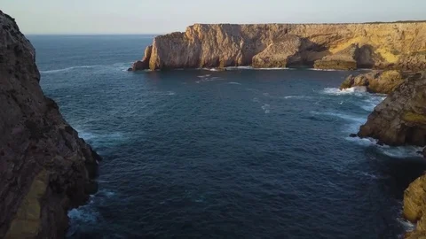 4k drone - Huge cliffs &amp; rugged coast - Algarve region of Portugal, near Lagos Stock Footage 82512002