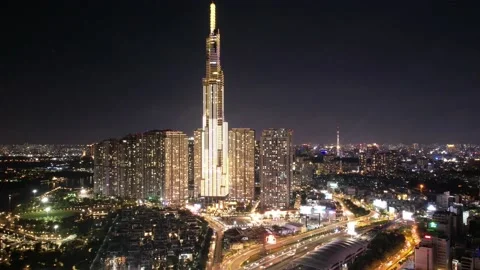 4k drone hyperlapse of  ho chi minh city during the night skyscrappers skyine Stock Footage 204004950