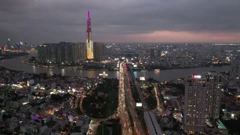 4k drone hyperlapse of  ho chi minh city during the night skyscrappers skyine Stock Footage 204004957