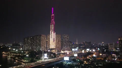 4k drone hyperlapse of  ho chi minh city during the night skyscrappers skyine Stock Footage 204004974